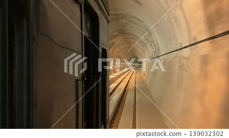 Underground Railway Tunnel Perspective from a Moving Train Carriage Underground Railway Tunnel Perspective from a Moving Train Carriage 139032302