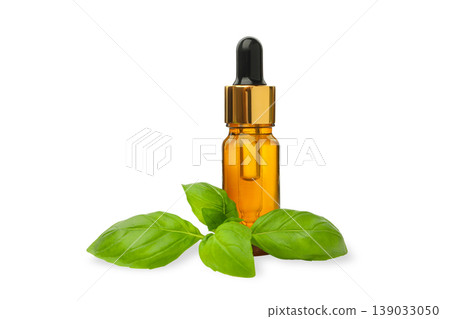 Basil leaves with an essential oil dropper bottle, PNG 139033050