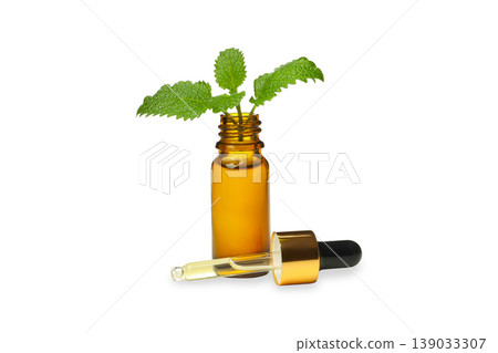 Mint leaves and essential oil in a bottle, PNG Mint leaves and essential oil in a bottle, PNG 139033307