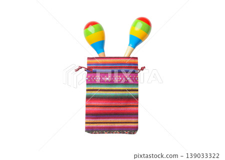 Maracas sit in a vibrant woven bag for celebration, isolated, PNG Maracas sit in a vibrant woven bag for celebration, isolated, PNG 139033322