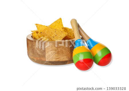Nachos in a wooden bowl with colorful maracas, isolated, PNG Nachos in a wooden bowl with colorful maracas, isolated, PNG 139033328