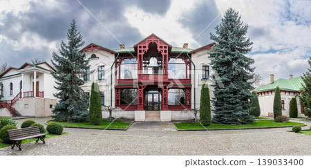 Ornate Red Wooden Veranda and Entrance of Curchi Monastery Building 139033400
