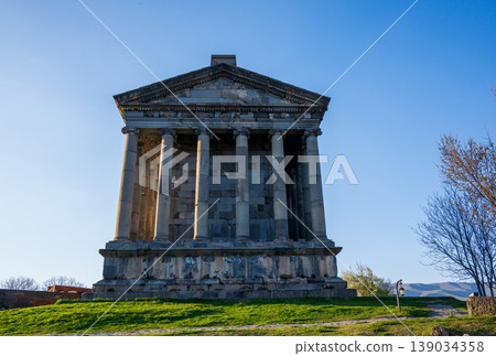 Grand ancient temple under bright blue sky Grand ancient temple under bright blue sky 139034358