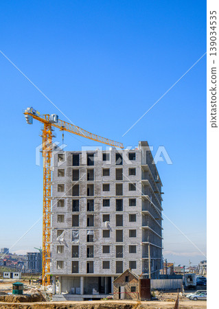 High-rise construction with crane 139034535
