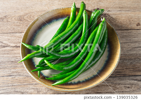Green chili peppers 139035326