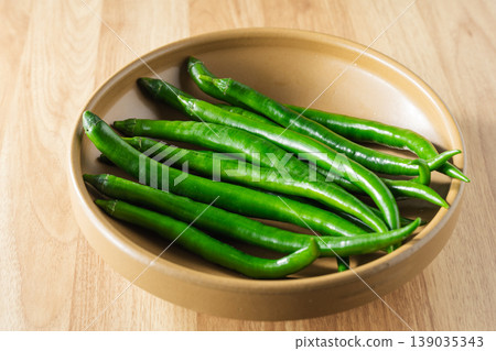 Green chili peppers 139035343