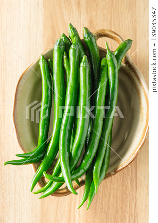 Green chili peppers Green chili peppers 139035347