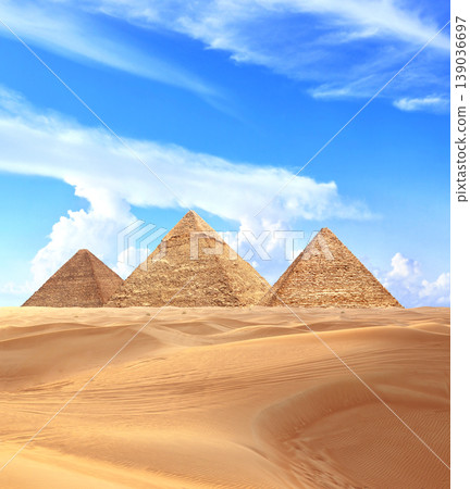 Famous Great Pyramids of Menkaure, Chephren and Cheops, Cairo, Egypt. Three iconic Great Pyramids and beautiful sand dunes, Giza Necropolis, have become a popular destination for travellers Famous Great Pyramids of Menkaure, Chephren and Cheops, Cairo, Egypt. Three iconic Great Pyramids and beautiful sand dunes, Giza Necropolis, have become a popular destination for travellers 139036697