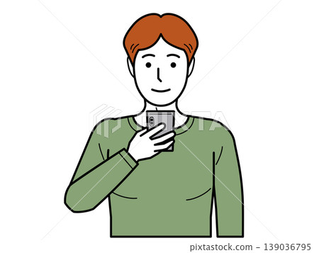 Facing forward. A young man in a T-shirt looking at his smartphone. Part 2 Facing forward. A young man in a T-shirt looking at his smartphone. Part 2 139036795