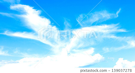 A refreshing blue sky with clouds that look like birds soaring. A refreshing blue sky with clouds that look like birds soaring. 139037278
