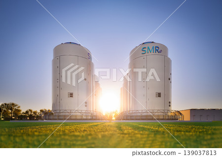 Group of smr or small modular nuclear reactors power plant against twilight sky Group of smr or small modular nuclear reactors power plant against twilight sky 139037813