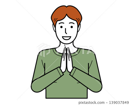 Facing forward. A young man in a T-shirt with his hands clasped together, saying "Itadakimasu" (thank you for the meal). Part 2 Facing forward. A young man in a T-shirt with his hands clasped together, saying "Itadakimasu" (thank you for the meal). Part 2 139037849
