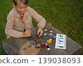 Flat stones become his canvas, and fruits and veggies become his art. A colorful masterpiece in the making. 139038093