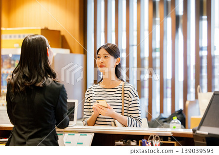 Young woman, receptionist, gym, trainer Young woman, receptionist, gym, trainer 139039593