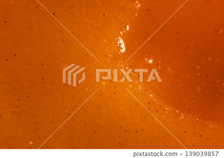 High quality shot capturing juicy apricot surface and textures. Photograph emphasizing glistening juice and porous texture of freshly picked apricot 139039857
