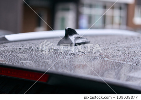 Hydrophobic effect on car paint: Detailed texture of water beads on a metallic surface Hydrophobic effect on car paint: Detailed texture of water beads on a metallic surface 139039877
