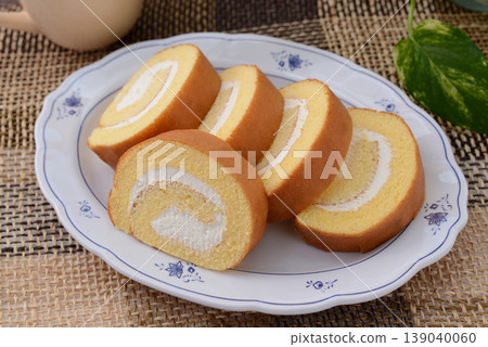 A delicious-looking roll cake on a plate A delicious-looking roll cake on a plate 139040060