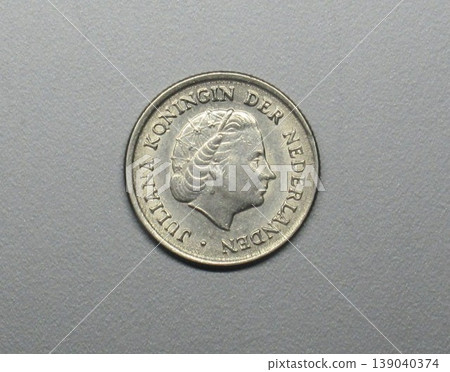 A 10-cent coin issued in the Netherlands in 1966. A 10-cent coin issued in the Netherlands in 1966. 139040374