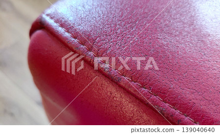 Red Leather Texture Close Up with Stitching Red Leather Texture Close Up with Stitching 139040640