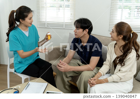 Asian Healthcare Professional Explaining Medication Prescription to Adult Patients During Health Consultation Medical Care Session at Home or Clinic Asian Healthcare Professional Explaining Medication Prescription to Adult Patients During Health Consultation Medical Care Session at Home or Clinic 139040847