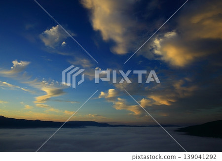 A mountain floating in the sea of clouds A mountain floating in the sea of clouds 139041292