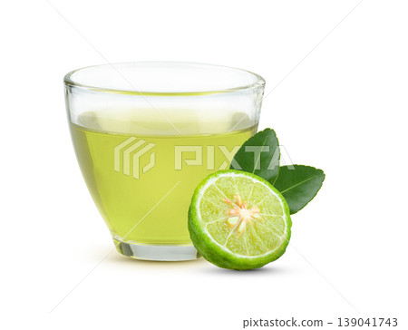 Herbal kaffir lime tea with natural health benefits, refreshing traditional drink made from aromatic citrus leaves, healthy beverage concept, wellness and herbal medicine theme on white background. Herbal kaffir lime tea with natural health benefits, refreshing traditional drink made from aromatic citrus leaves, healthy beverage concept, wellness and herbal medicine theme on white background. 139041743