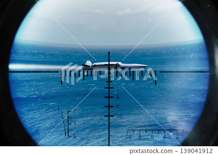 A military missile is tracked in a targeting scope, symbolizing strait blockade and regional tension. 139041912