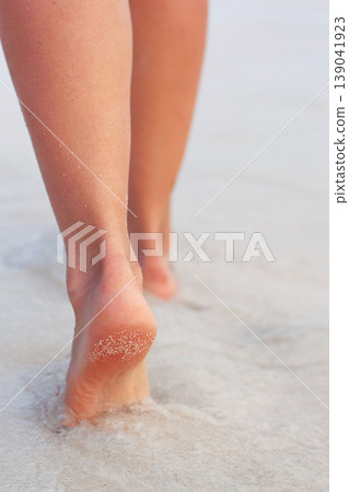 Close up of woman leg on the beach Close up of woman leg on the beach 139041923