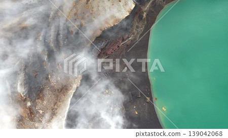 An aerial view from directly above, conveying the geothermal and volcanic activity of the hot spring area. 139042068