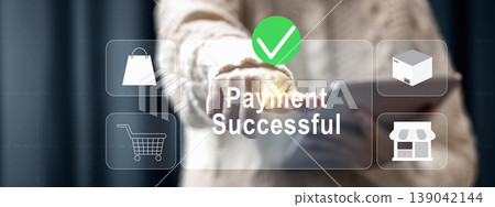 A person confirming a successful online payment on a tablet interface with icons for shopping carts, bags, and delivery, representing a seamless digital e-commerce experience 139042144