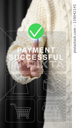 Close-up of a hand interacting with a digital interface showing Payment Successful and e-commerce icons, symbolizing secure online transactions and mobile shopping Close-up of a hand interacting with a digital interface showing Payment Successful and e-commerce icons, symbolizing secure online transactions and mobile shopping 139042145