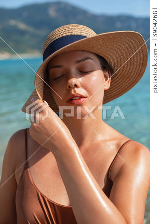 Attractive Woman Touching Skin And Enjoying Sun At Beach. Beauty Skincare Routine. Female Relaxing Under Sunlight During Summer Vacation Attractive Woman Touching Skin And Enjoying Sun At Beach. Beauty Skincare Routine. Female Relaxing Under Sunlight During Summer Vacation 139042681