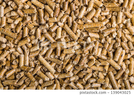 Close-Up Of Wood Pellets Biomass Fuel Pile For Sustainable Heating And Renewable Energy 139043025