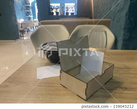 a box of bill on a table in restaurant a box of bill on a table in restaurant 139043212