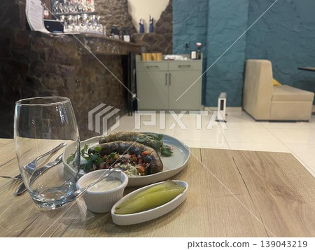 plates of food on a table in restaurant plates of food on a table in restaurant 139043219