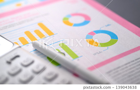 Graph, calculator, and pen Graph, calculator, and pen 139043638