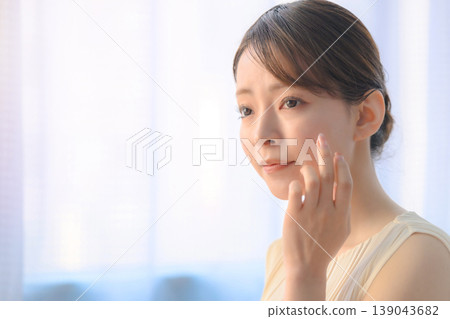 A woman's profile as she touches her face: Happy Pop A woman's profile as she touches her face: Happy Pop 139043682
