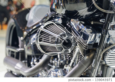 Close-up of a custom motorcycle engine and air cleaner. 139043971