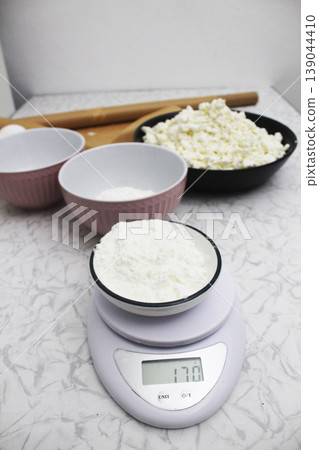 Weighing of products, sugar, flour for cake Weighing of products, sugar, flour for cake 139044410