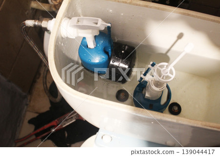Close-up toilet tank trigger. toilet Close-up toilet tank trigger. toilet 139044417