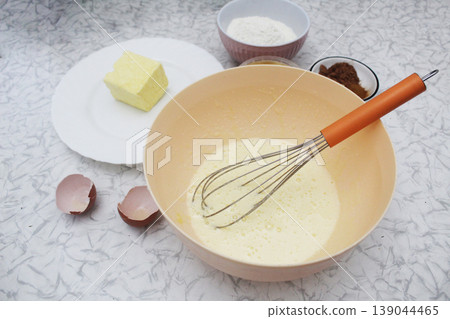 Close-up of the dough in a bowl. Baking Close-up of the dough in a bowl. Baking 139044465