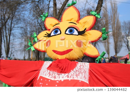 Close-up of Maslenitsa. Big funny doll to burn for the holiday of Slavic Maslenitsa Close-up of Maslenitsa. Big funny doll to burn for the holiday of Slavic Maslenitsa 139044482