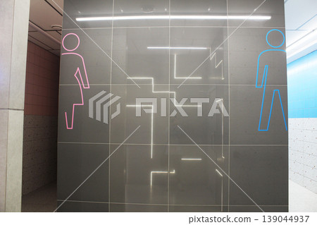 Separation into women's and men's toilets in the shopping center Separation into women's and men's toilets in the shopping center 139044937