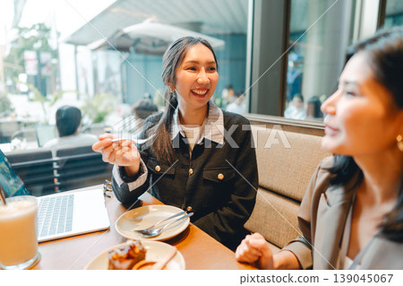 Relax two young adult asian woman talking positive friendship conversation happiness at restaurant Relax two young adult asian woman talking positive friendship conversation happiness at restaurant 139045067
