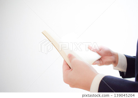 Businessman and book Businessman and book 139045204