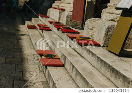 Red pillows on the steps in Split old town, Croatia. 139045314