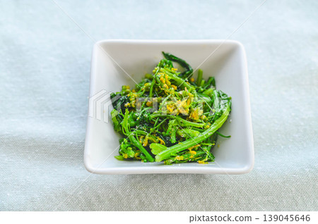 Rapeseed blossoms with sesame dressing Rapeseed blossoms with sesame dressing 139045646