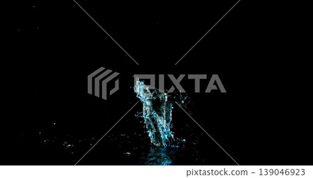 High-speed water splash isolated on black background, dynamic liquid shape frozen mid-air with fine droplets. Minimal composition ideal for VFX overlay and creative compositing. High-speed water splash isolated on black background, dynamic liquid shape frozen mid-air with fine droplets. Minimal composition ideal for VFX overlay and creative compositing. 139046923