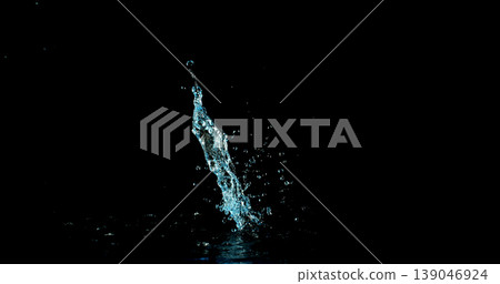 High-speed water splash isolated on black background, dynamic liquid shape frozen mid-air with fine droplets. Minimal composition ideal for VFX overlay and creative compositing. High-speed water splash isolated on black background, dynamic liquid shape frozen mid-air with fine droplets. Minimal composition ideal for VFX overlay and creative compositing. 139046924
