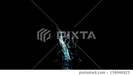 High-speed water splash isolated on black background, dynamic liquid shape frozen mid-air with fine droplets. Minimal composition ideal for VFX overlay and creative compositing. High-speed water splash isolated on black background, dynamic liquid shape frozen mid-air with fine droplets. Minimal composition ideal for VFX overlay and creative compositing. 139046925